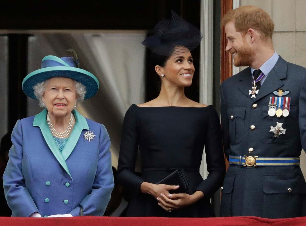 File photo of Queen Elizabeth II, Meghan Markle and Prince Harry.