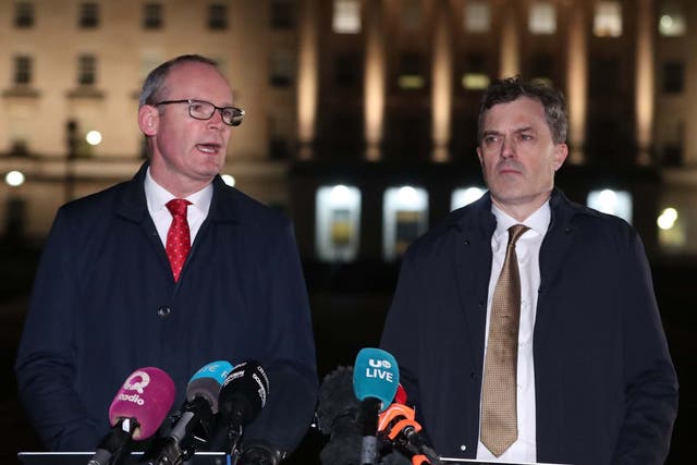 Irish foreign affairs minister Simon Coveney (left) and secretary of state for Northern Ireland Julian Smith issue a statement outside Stormont Parliament buildings in Belfast, 9 January, 2020.