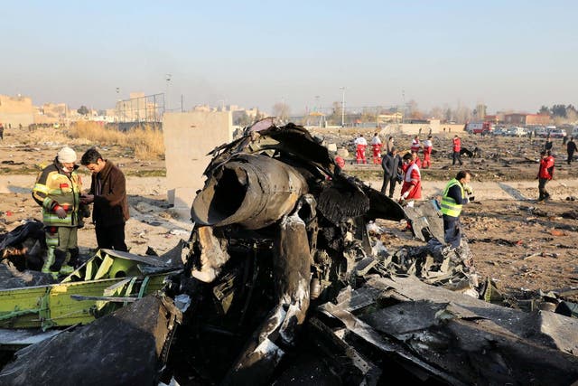 Debris at the scene where a Ukrainian plane crashed in Shahedshahr, southwest of Tehran