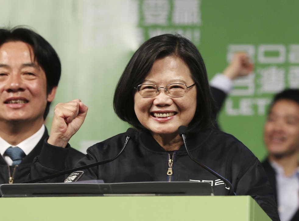 Tsai Ing-wen celebrates her re-election with supporters at a rally