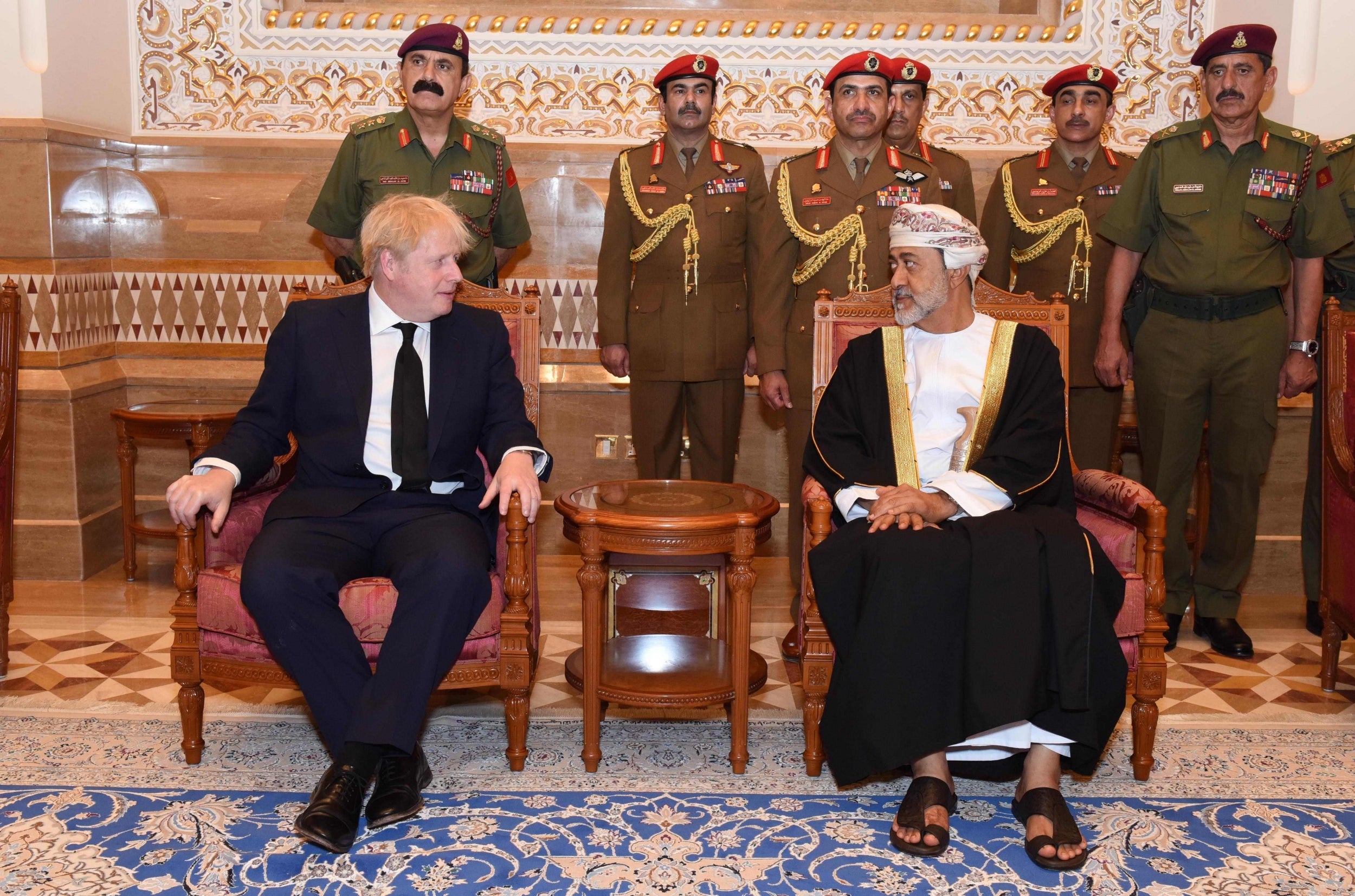 Oman's newly sworn-in Sultan Haitham bin Tariq receiving Britain's Prime Minister Boris Johnson in the capital Muscat on Sunday