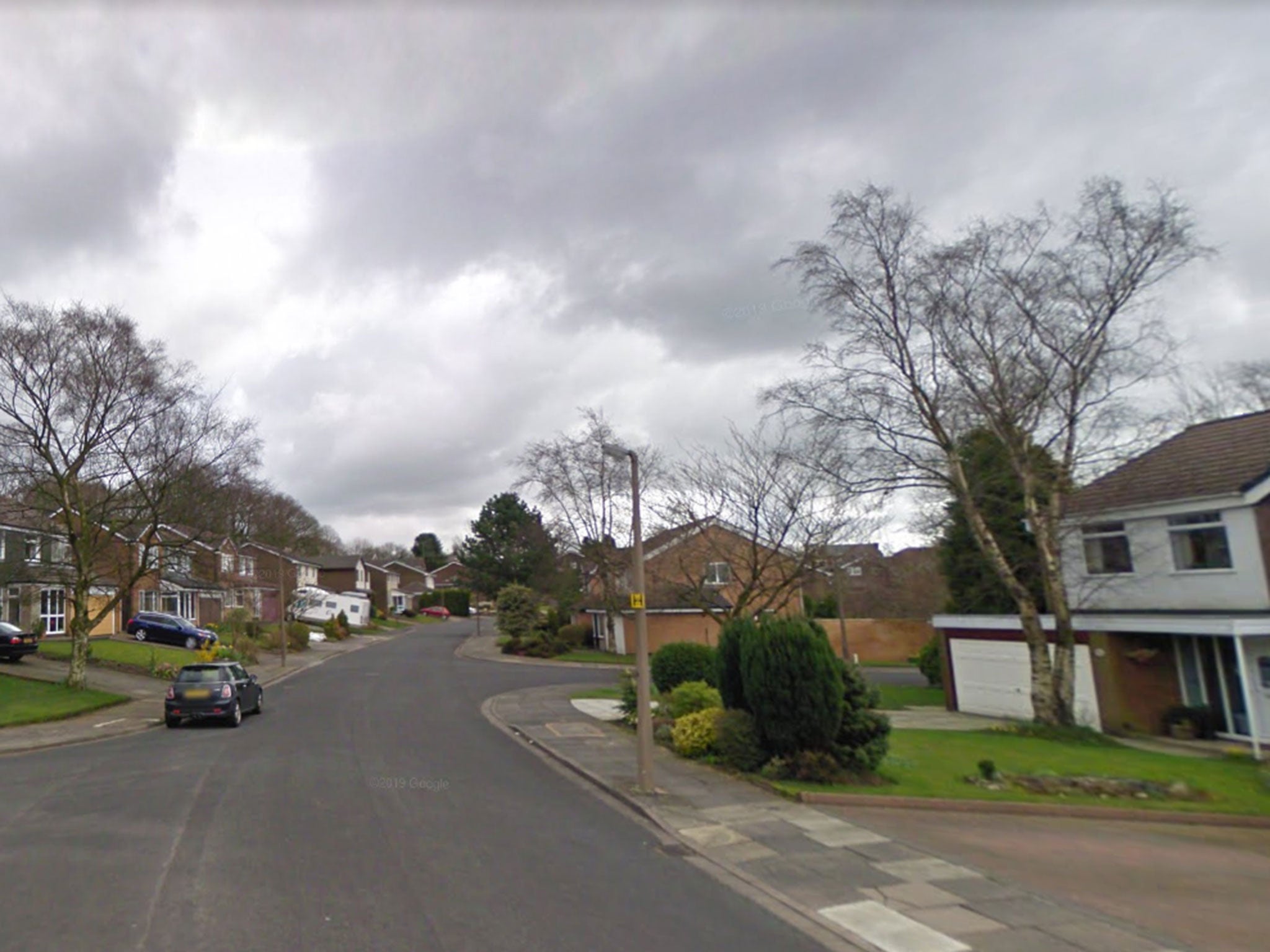 The woman was attacked at her home in Purbeck Drive, Bolton