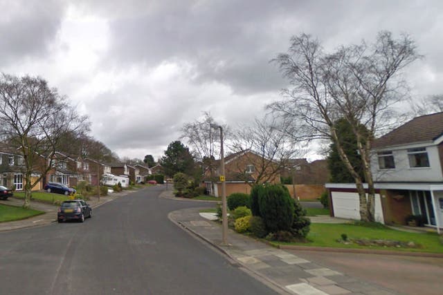 The woman was attacked at her home in Purbeck Drive, Bolton