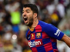 Barcelona’s Liga and Champions League hopes rocked by Suarez injury