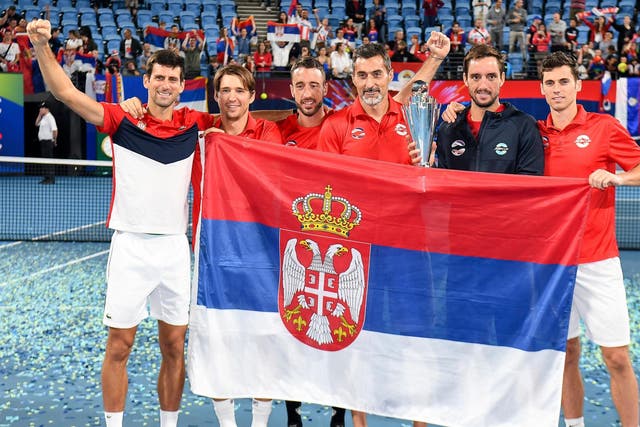 Novak Djokovic and his team celebrate victory in Sydney