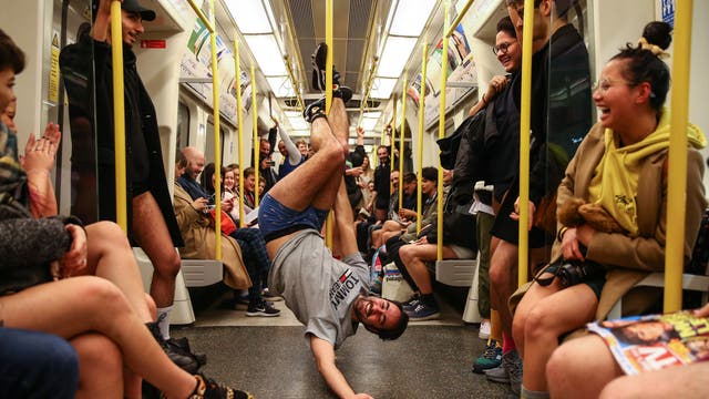 No Trousers Tube Ride: Passengers strip down to underwear on