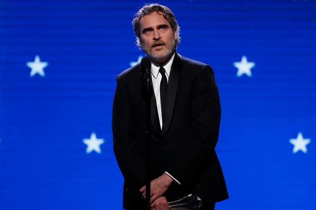 Joaquin Phoenix accepts the award for Best Actor at the Critics' Choice Awards