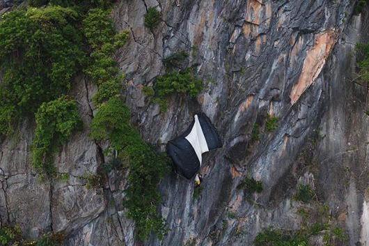 The parachutist was brought down safely by members of the Phatthalung Rescue Team