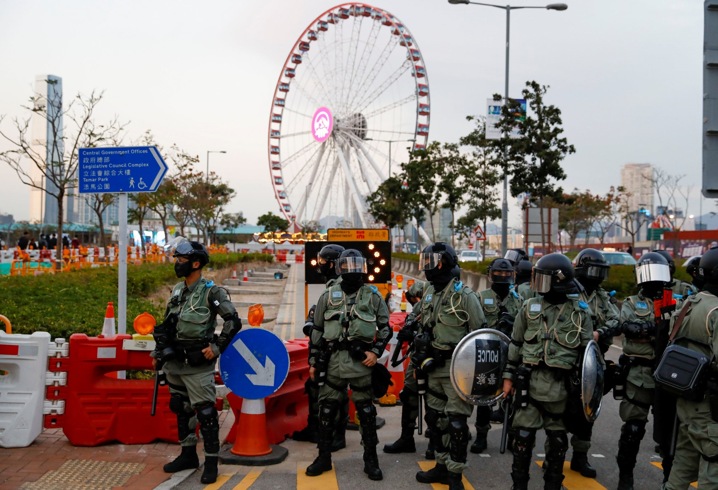 Riot police stand guard after a protest at Edinburgh Place in Hong Kong on Sunday