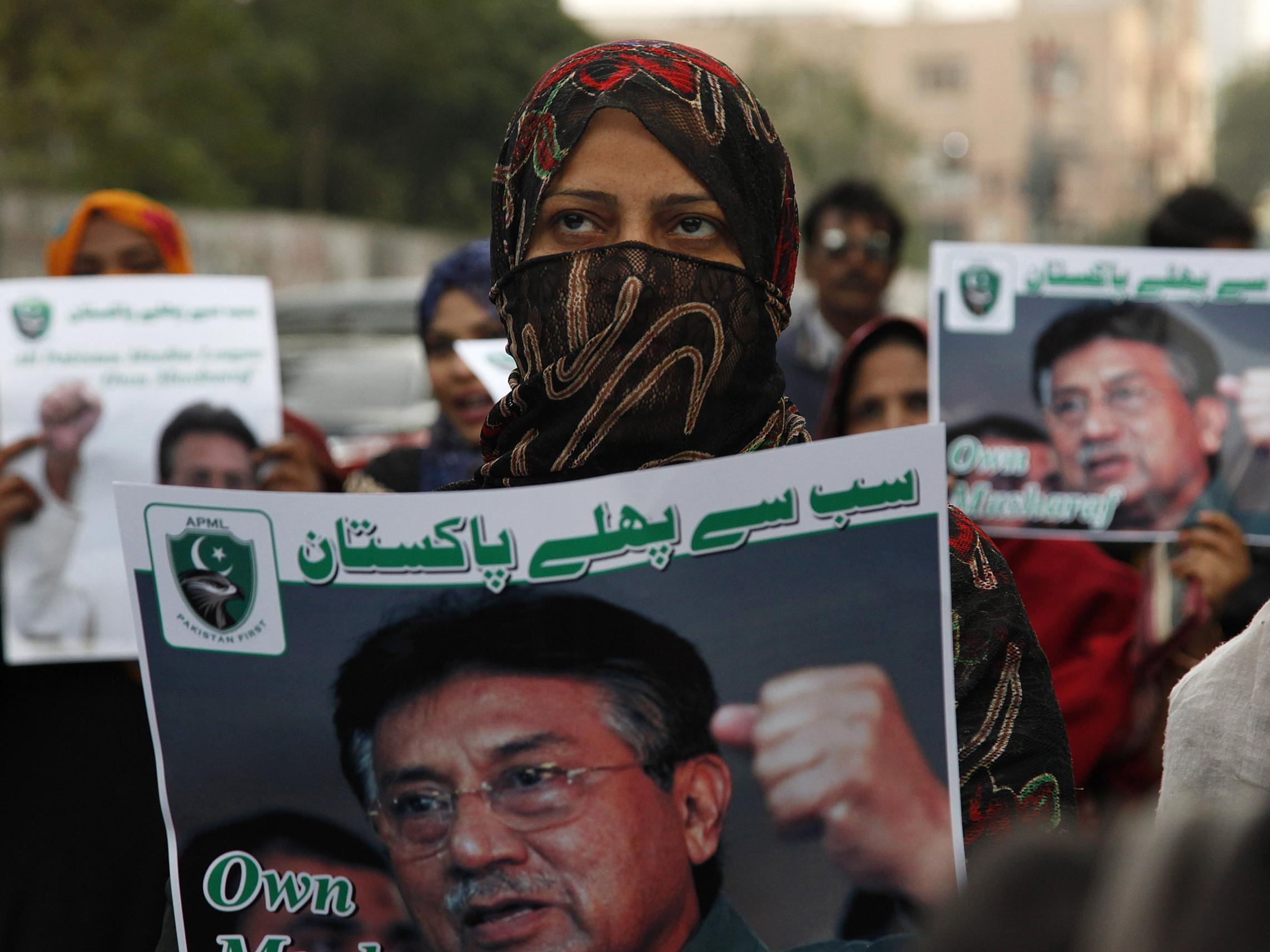 Supporters of former Pakistani military ruler General Pervez Musharraf protest a court's death sentence decision, in Karachi Wednesday Jan 1 2020 (AP/Ikram Suri)