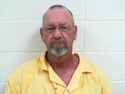 Jeff Beasley is in custody after being charged with the 1990 killing of a woman in Ozark, Alabama.