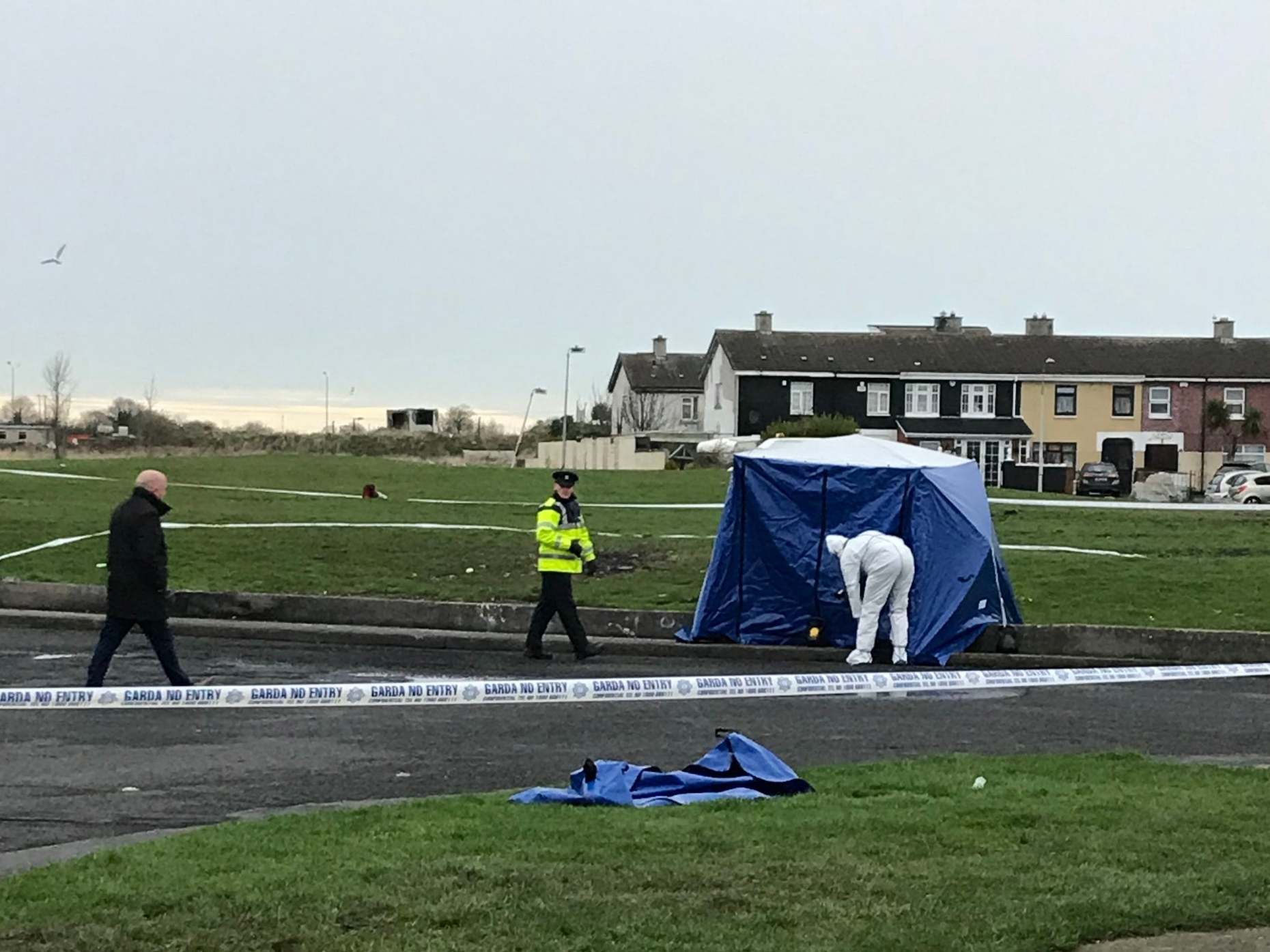 Gardai at a scene in Coolock, north Dublin, where human body parts where found in a bag