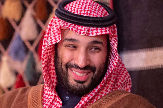 A handout picture provided by the Saudi Royal Palace on January 12, 2020