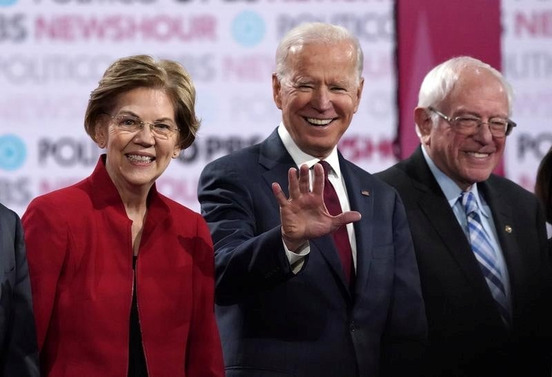 Candidates Elizabeth Warren, Michael Bloomberg, and Bernie Sanders at a Democrat debate