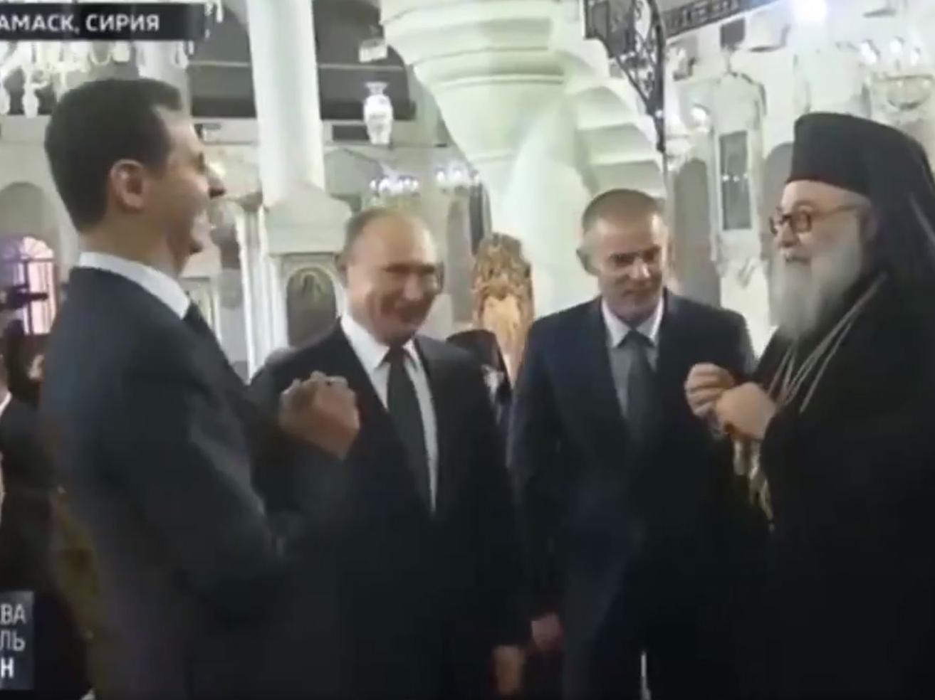 Putin and Assad caught on video mocking Trump