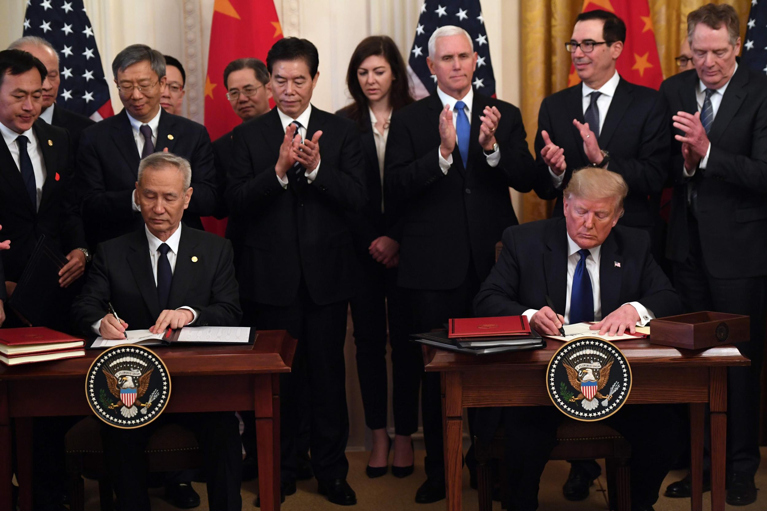 Donald Trump, and China's Vice Premier Liu He, the country's top trade negotiator, sign a trade agreement between the US and China during a ceremony in the East Room of the White House