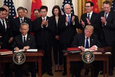 Trump signs first phase of China trade deal amid tariffs war