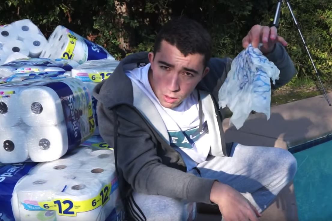 YouTuber throws '100,000' paper towel rolls into pool (YouTube)