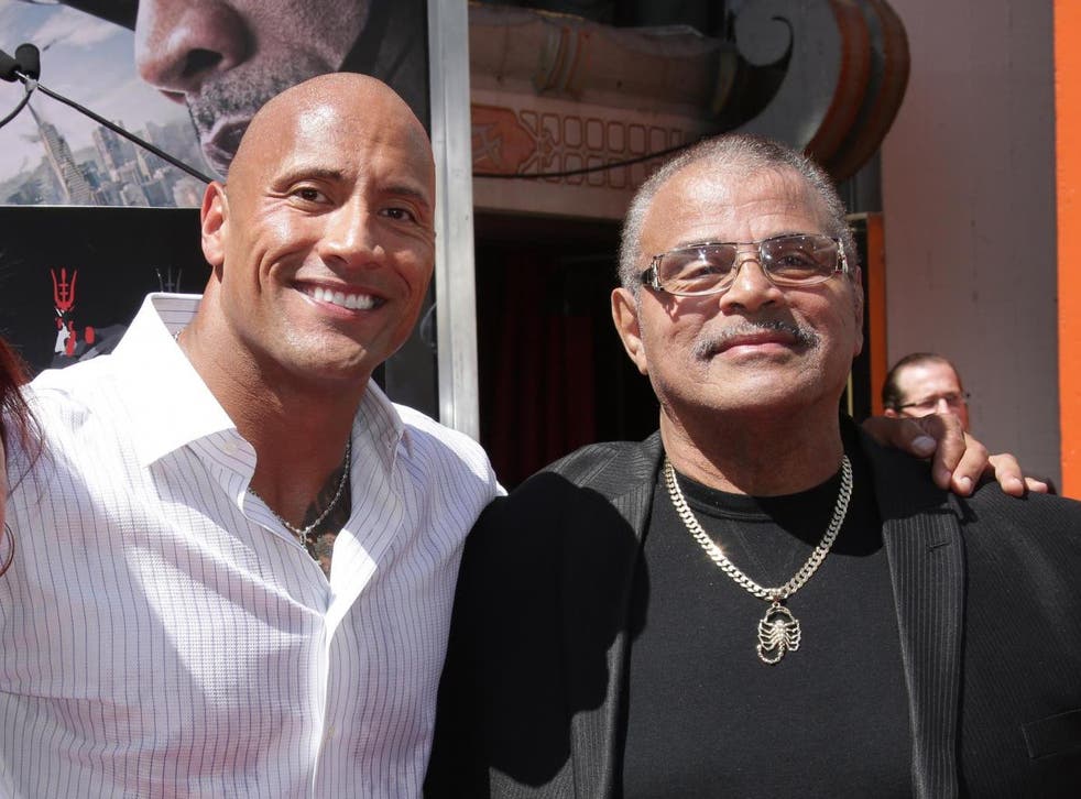 Dwayne and Rocky Johnson in 2015