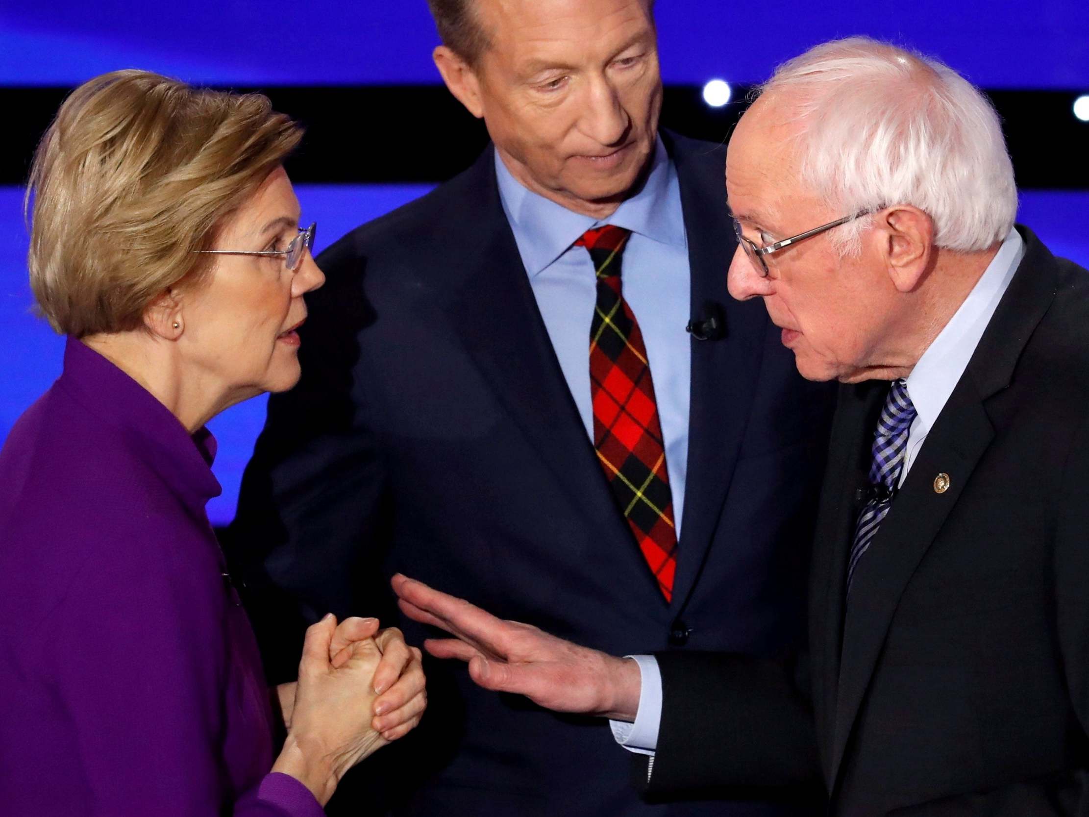 Elizabeth Warren and Bernie Sanders heard at end of TV debate accusing each other of calling them a 'liar'