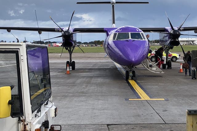 Purple patch: a Flybe Q400 at Edinburgh airport, before the airline collapsed in March 2020