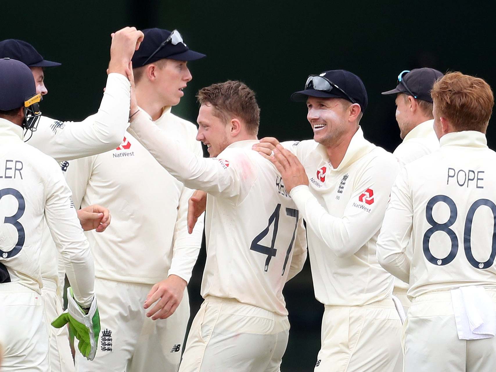 England rally around Bess after making the breakthrough on day three