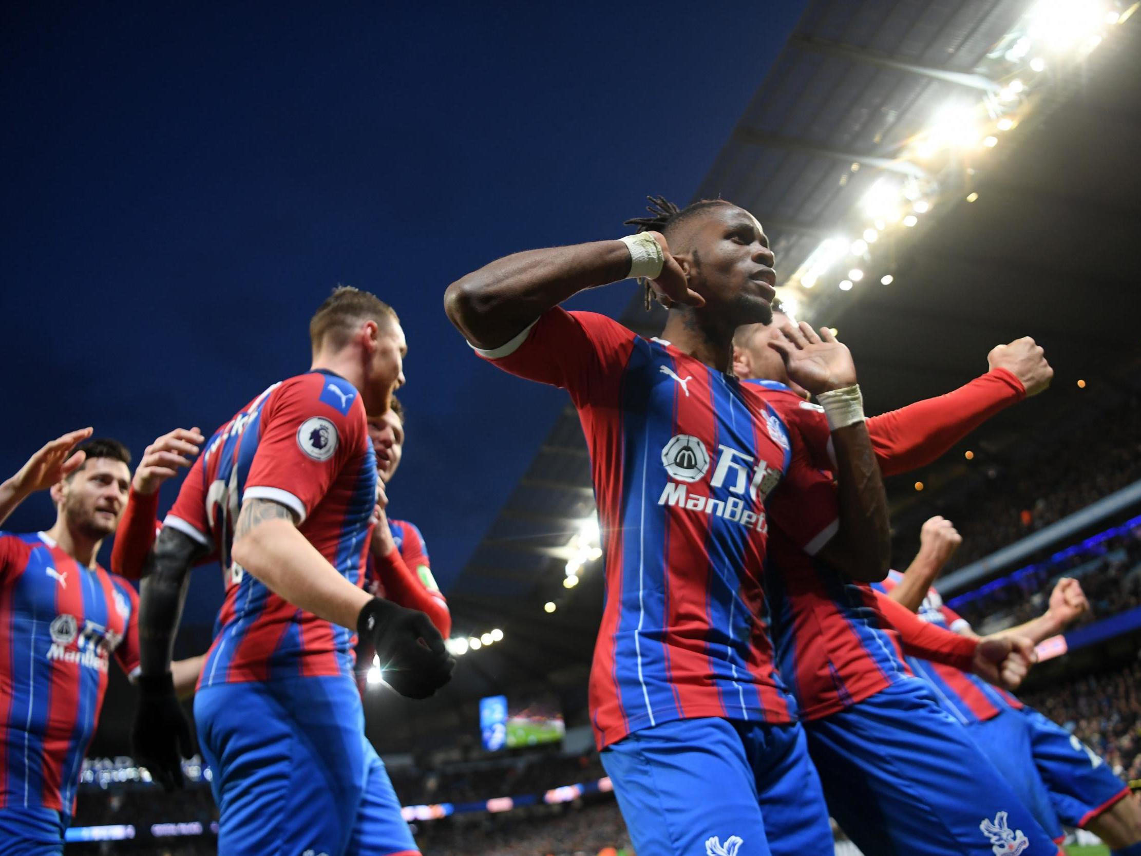 Crystal Palace celebrate after equalising late on at the Etihad Stadium