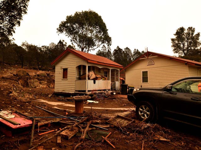 Flood-damaged property is seen in the bushfire-affected town of Cooma