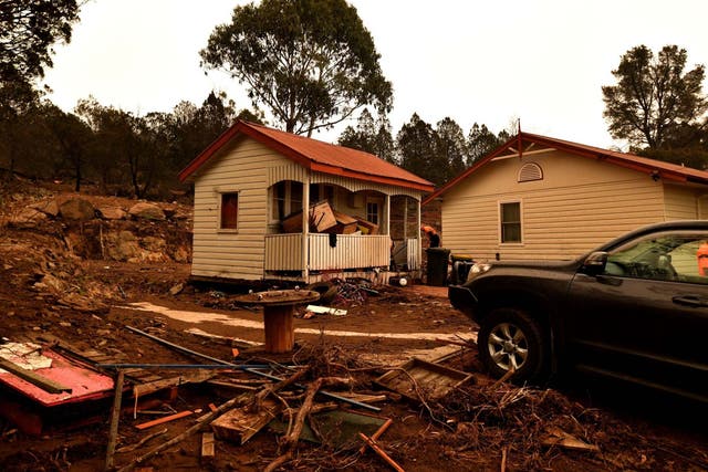 Flood-damaged property is seen in the bushfire-affected town of Cooma