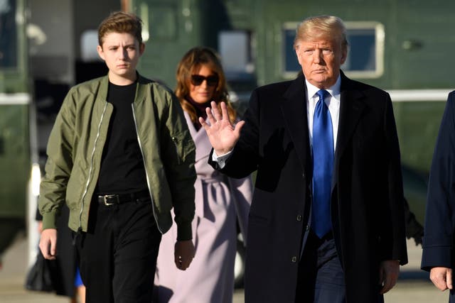 Donald Trump with first lady Melania and their son Barron at Andrews Air Force base in Maryland on their way to Mar-a-Lago in Florida