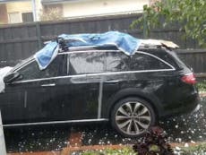 Australia battered by golf ball-sized hail as extreme weather persists