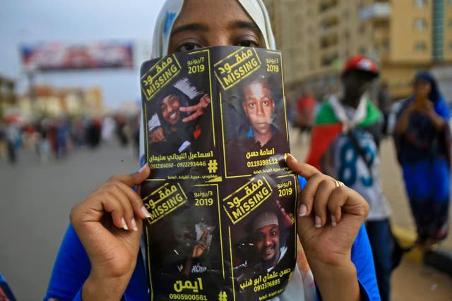 Sudanese protester Ismail, who vanished in June, features on a missing poster