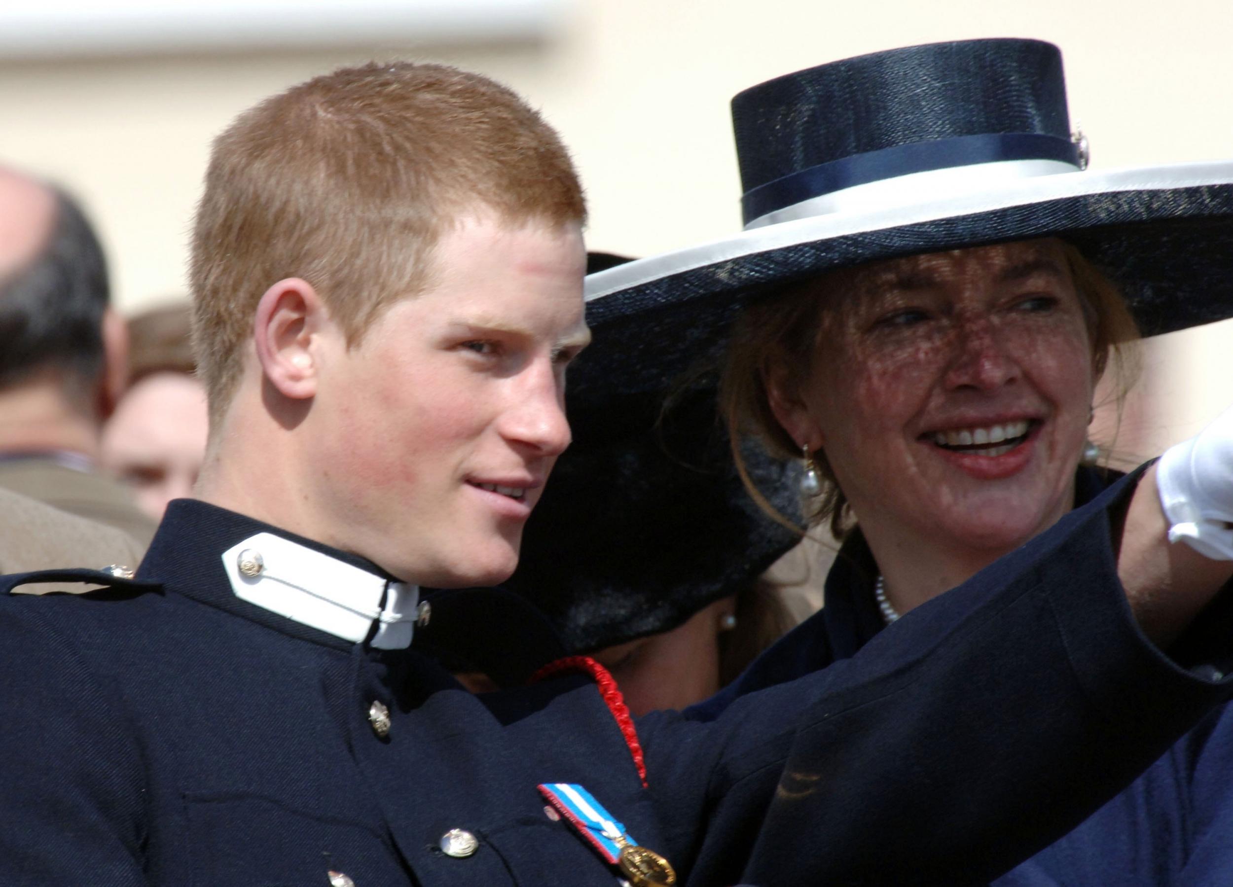 Prince Harry talks to his former nanny, Tiggy Pettifer (formerly Tiggy Legge-Bourke) during his passing-out Sovereign’s Parade at Sandhurst Military Academy on 12 April 2006