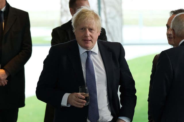 Johnson arrives for an international summit on securing peace in Libya in Berlin on Sunday