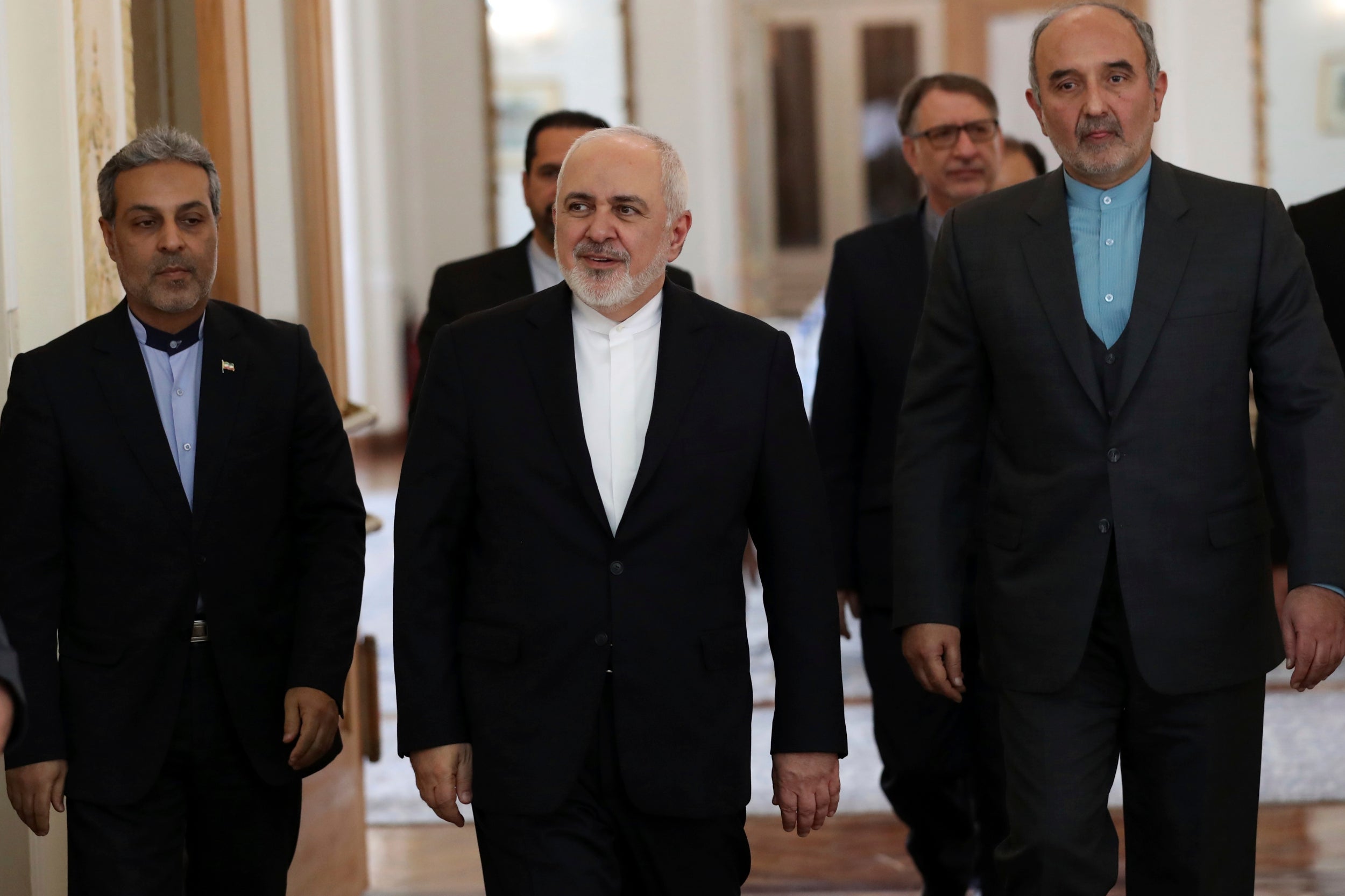 Foreign minister Mohammad Javad Zarif (centre) arrives prior to a meeting with his Venezuelan counterpart in Tehran