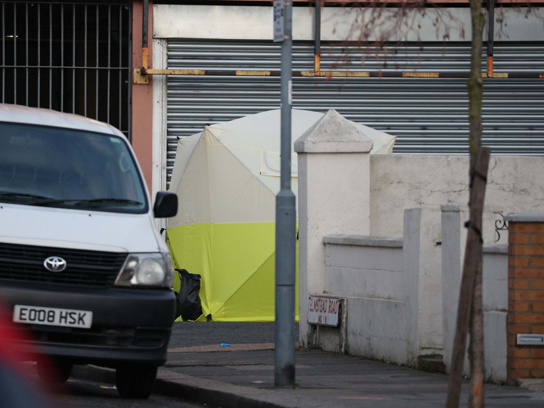 An evidence tent at the junction of Salisbury Road and Elmstead Road (PA)