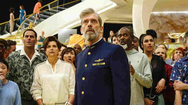Cosmic jokes: Hugh Laurie plays the ship’s captain in the ‘spacecom’