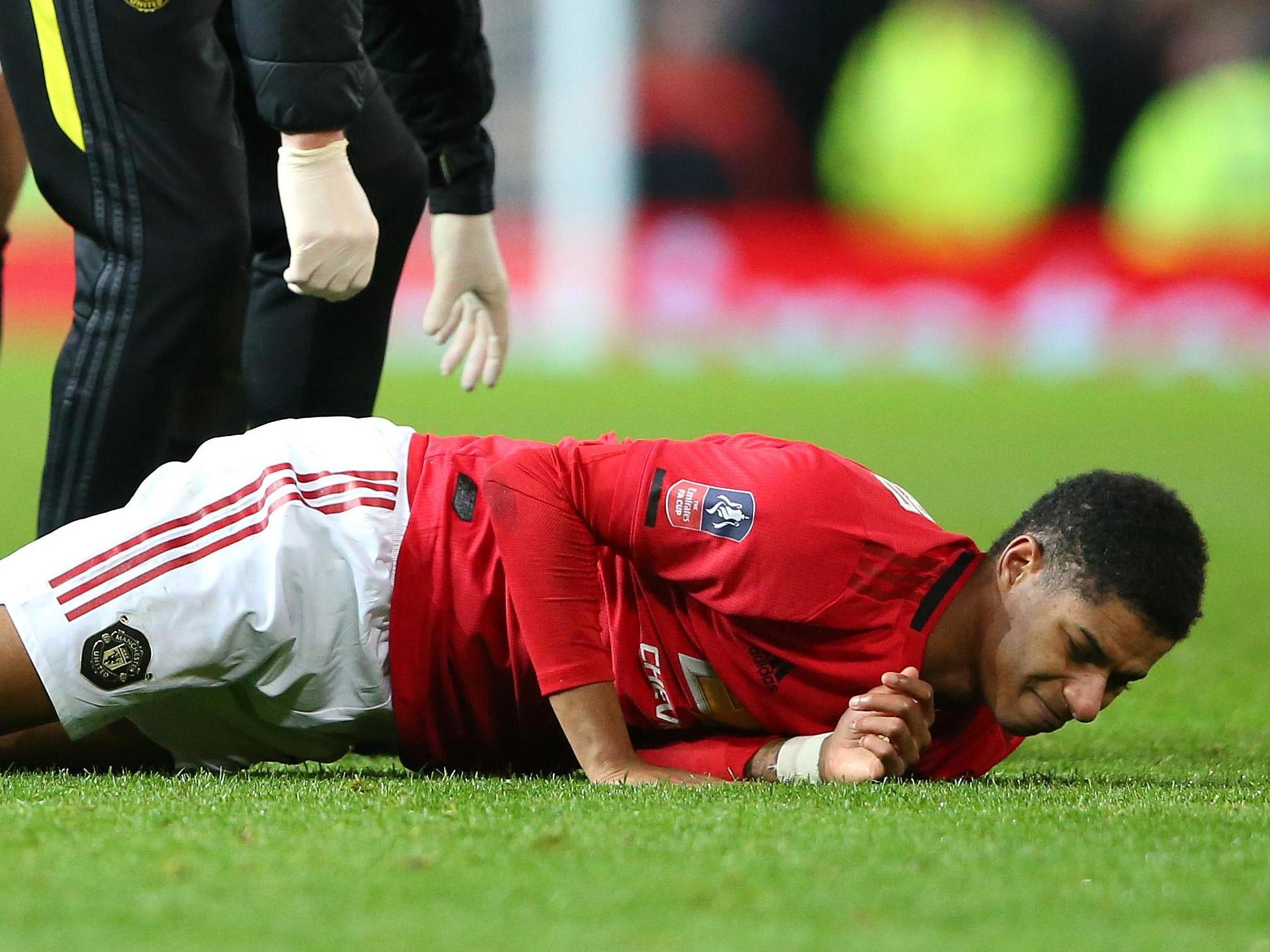 Manchester United striker Marcus Rashford helping to feed local