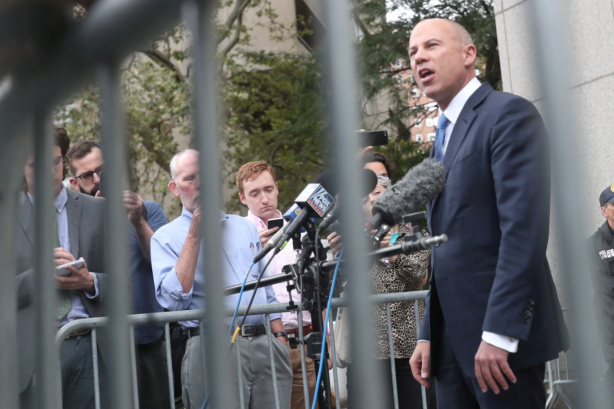 Michael Avenatti speaks to reporters outside a courthouse in New York City