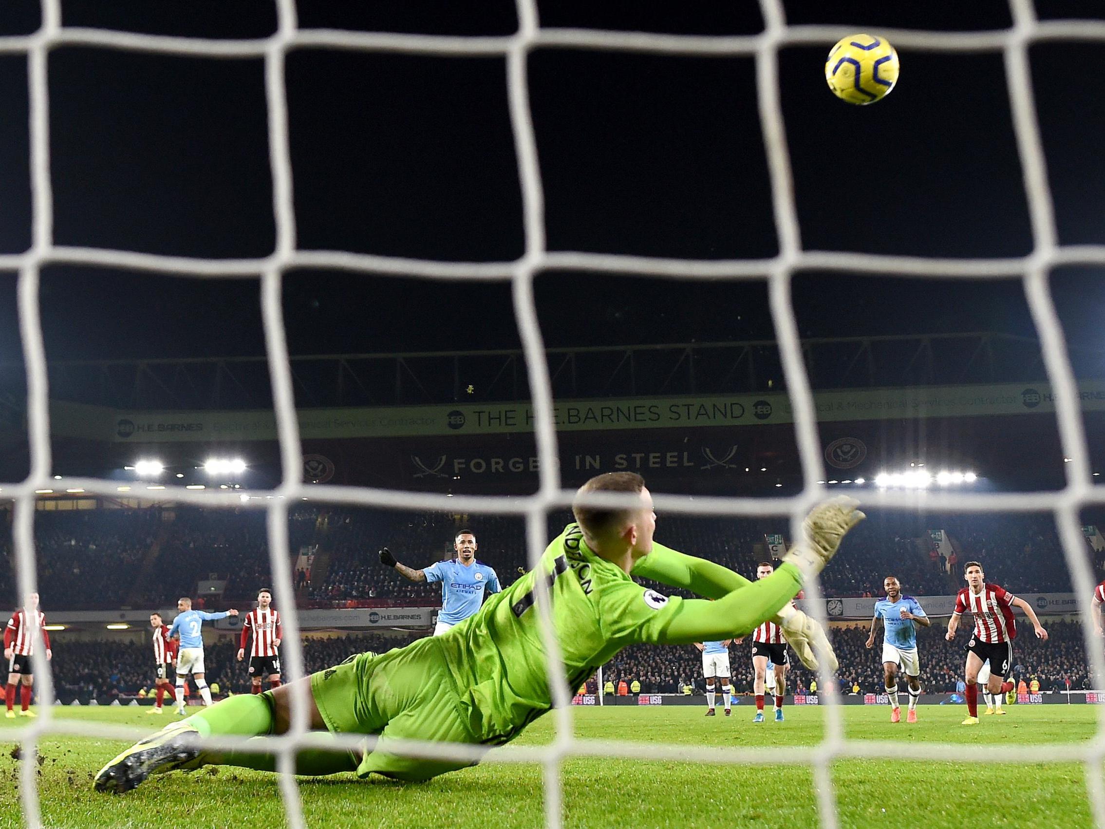 Sheffield United goalkeeper Dean Henderson saves Gabriel Jesus's penalty