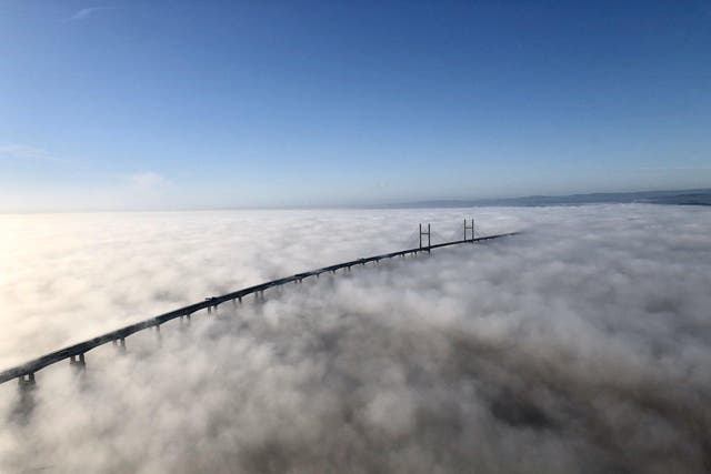 Aerial images captured by a National Police Air Service helicopter show the Severn Bridge, which links Wales and England, shrouded in fog, 21 January, 2020. The fog is believed to have been caused by a phenomenon known as temperature inversion.