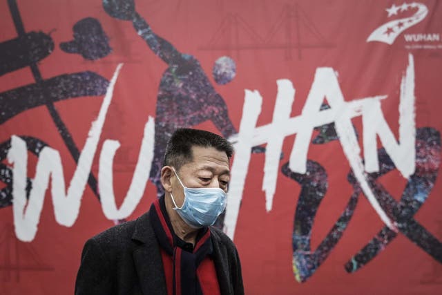 Wuhan residents have been told they must wear masks in public places as officials battle to halt the spreads of the disease