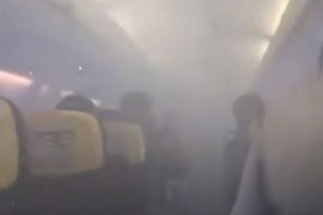 Still image from video of smoke filling the cabin of a Ryanair flight to London Stansted shortly after take-off from Bucharest, Romania, on 21 January, 2020.