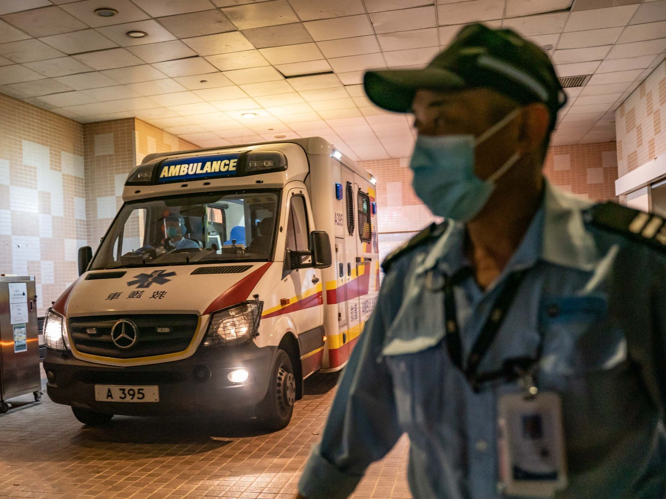 An ambulance arrives with a patient at a Hong Kong hospital