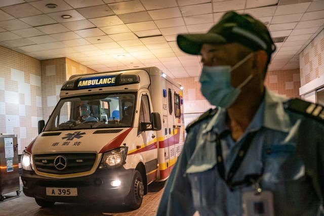 An ambulance arrives with a patient at a Hong Kong hospital