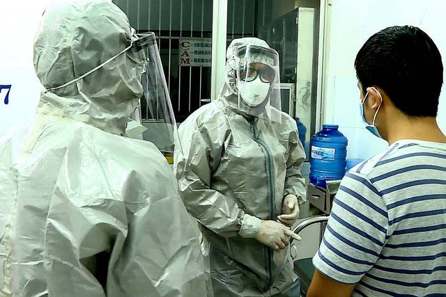 One of the two Chinese nationals in Vietnam who tested positive for coronavirus is treated in Cho Ray hospital in Ho Chi Minh City on Thursday