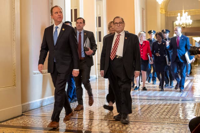 House Judiciary Committee Chairman Jerrold Nadler (right) walks to the Senate chamber with House Intelligence Committee Chairman Adam Schiff and other House impeachment managers. AP