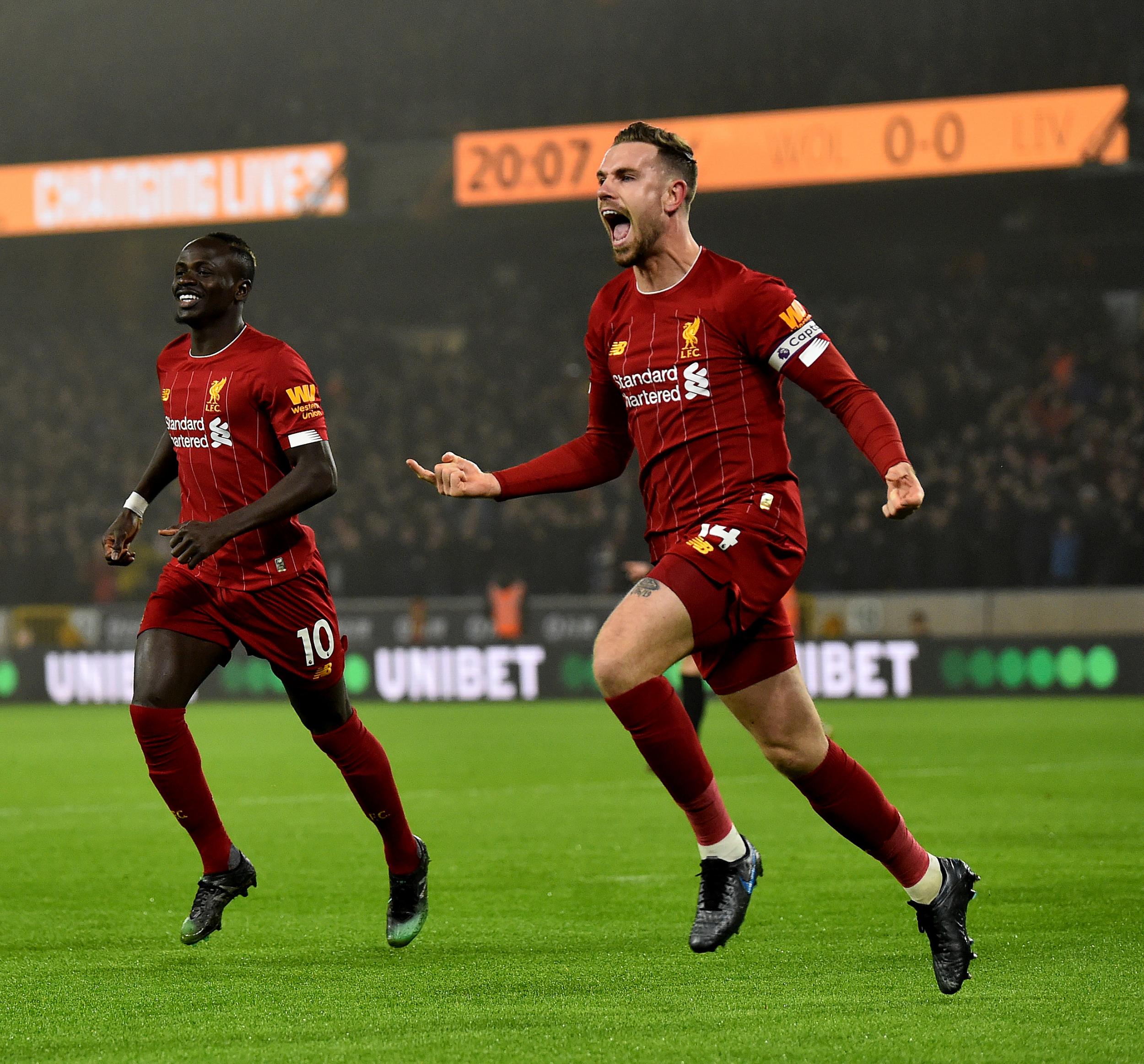 Jordan Henderson celebrates putting Liverpool ahead