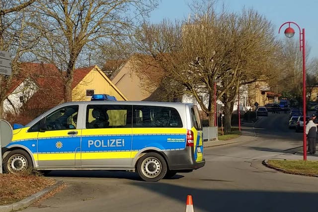 Police secure the area following a shooting in Bahnhoftrasse, Rot am See