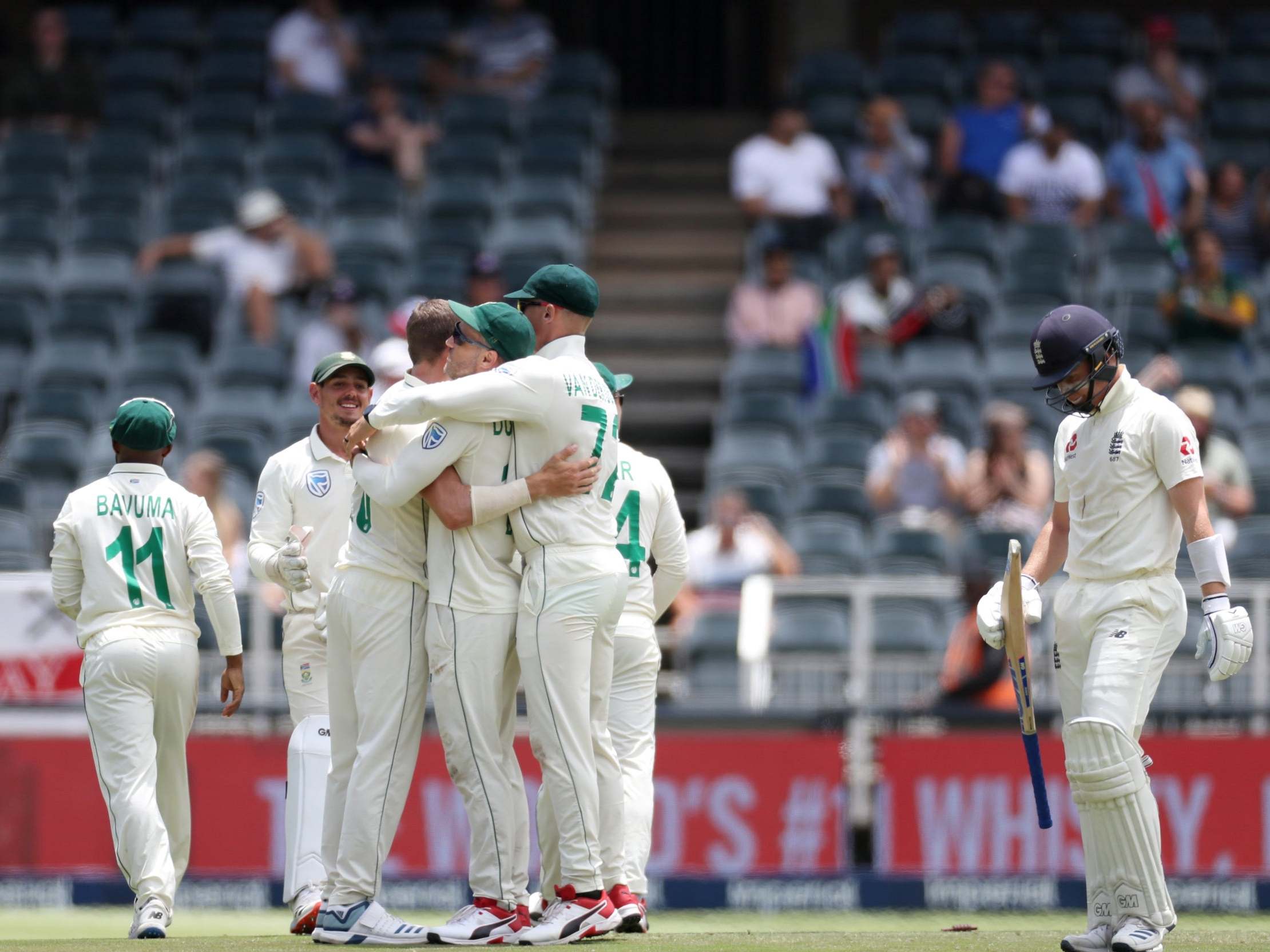 South Africa celebrate as Ollie Pope walks off